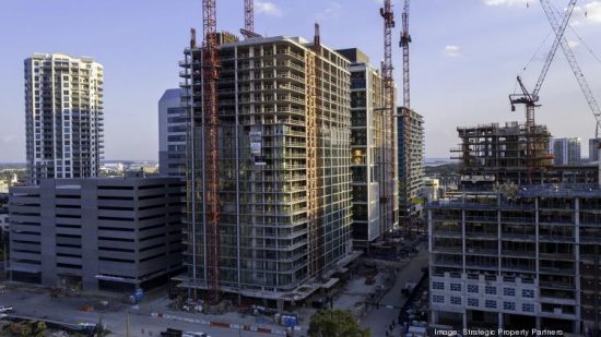 A photo of Water Street Tampa under construction in mid-October 2020 shows the Cumberland parking garage.  Strategic Property Partners