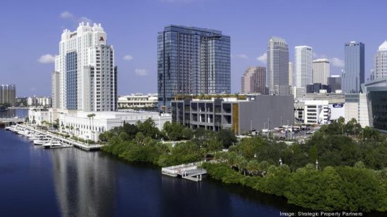 A mid-October shot of Water Street Tampa, viewed from the Beneficial Bridge, shows Amalie Arena, the JW Marriott and the Tampa Marriott Water Street. Strategic Property Partners